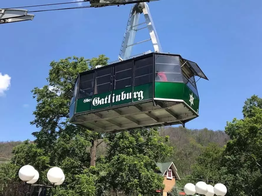 The Ober Gatlinburg Aerial Tramway with trees in the background.