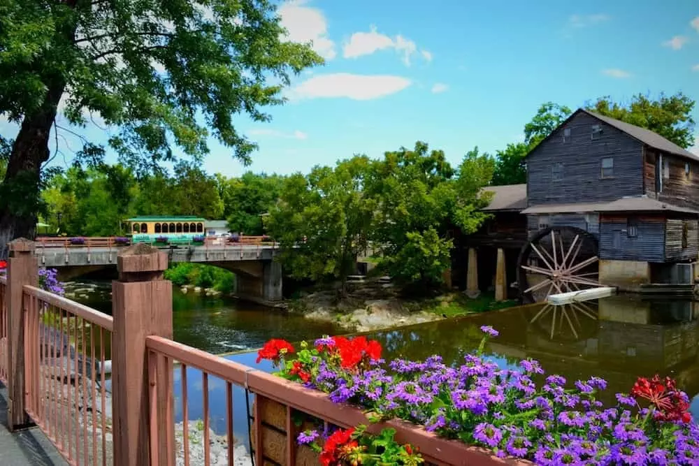 The Old Mill with beautiful spring flowers.