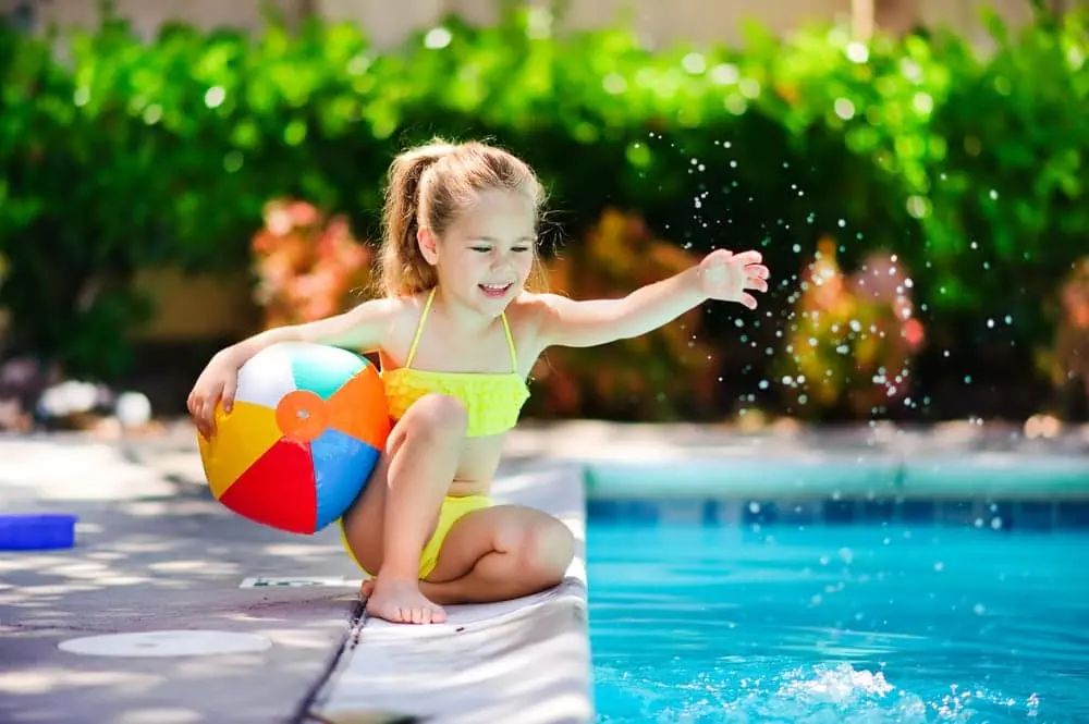 Little girl enjoying our Smoky Mountain cabins with pool access.