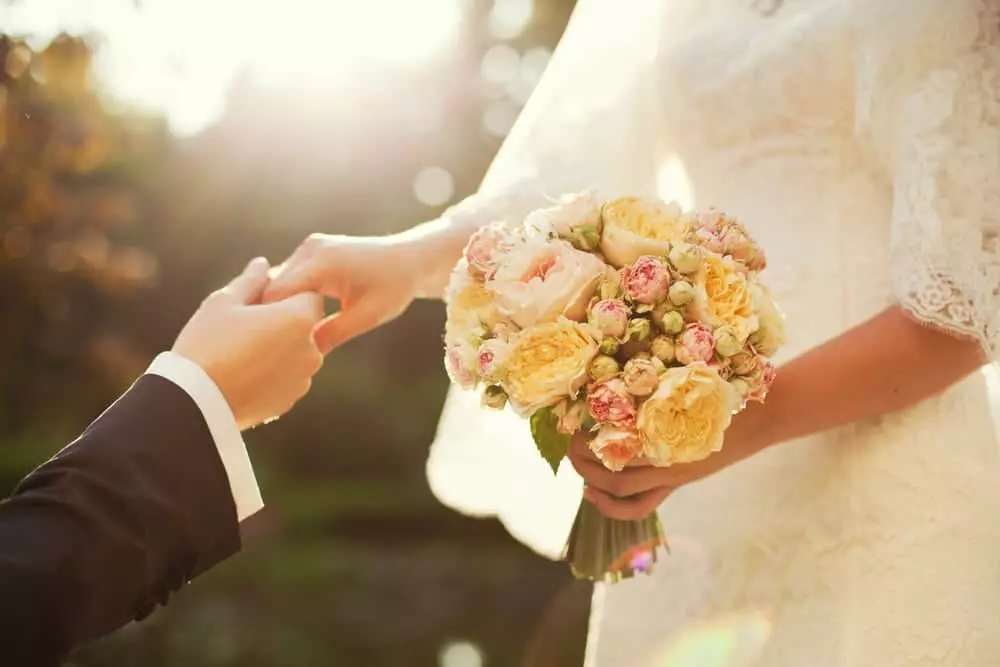 Bride and groom with flowers at Pigeon Forge wedding venue