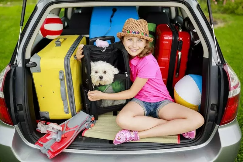 girl and dog ready for Smoky Mountain vacation