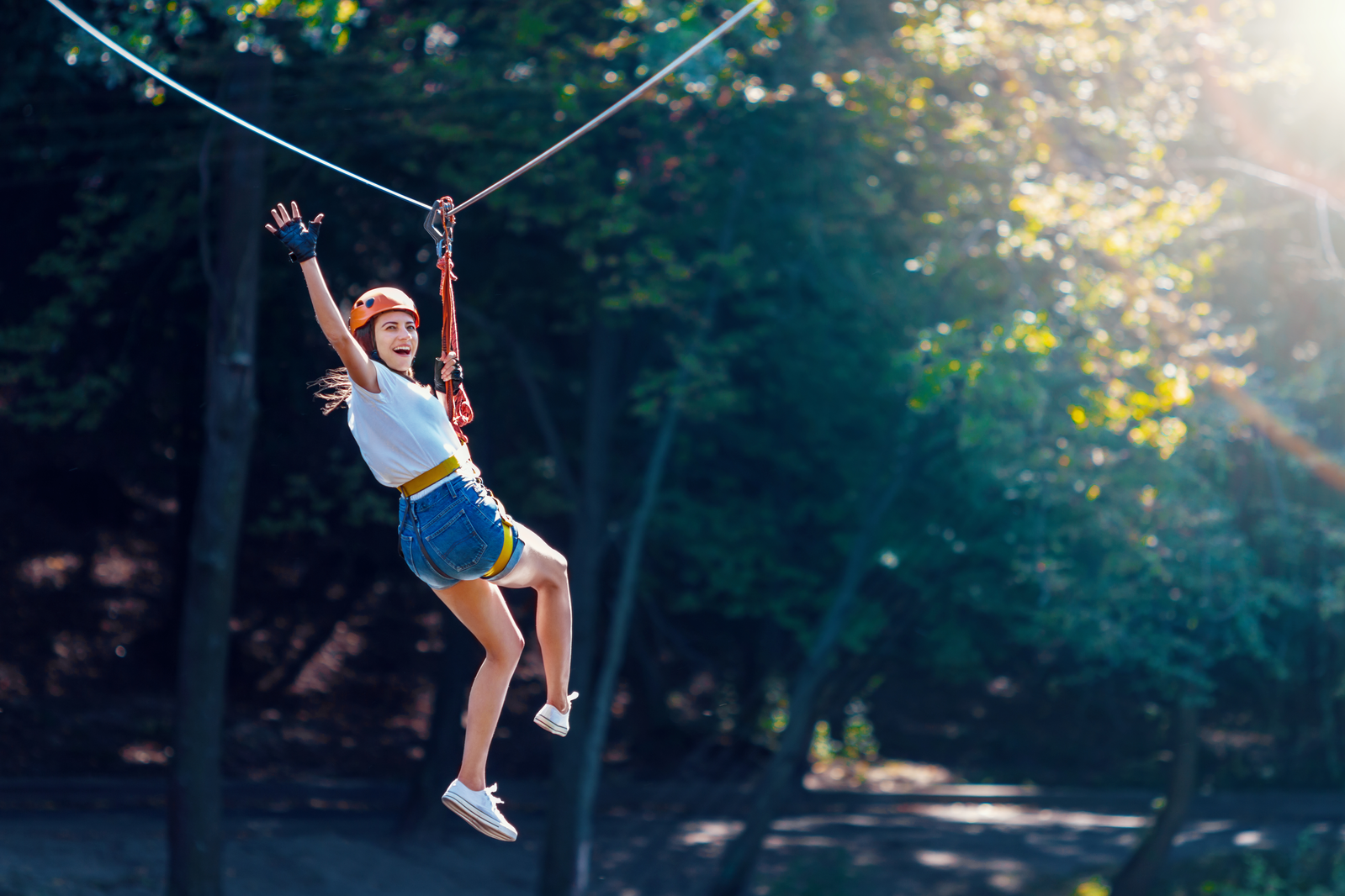 girl going ziplining