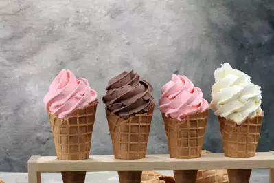 strawberry, chocolate, vanilla ice cream waffle cones