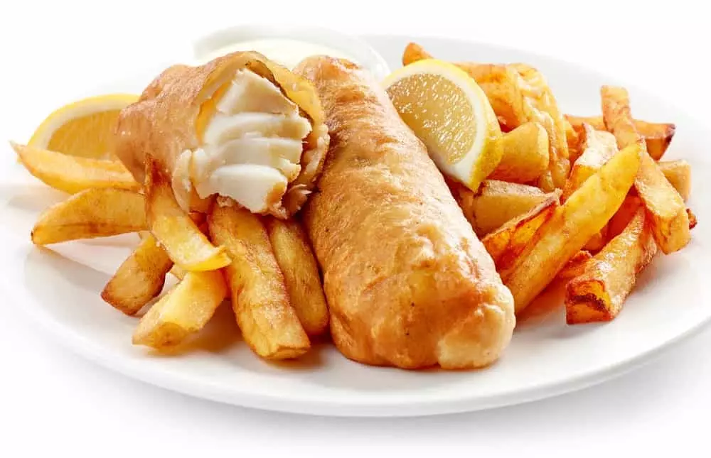 fish and chips with lemon wedges