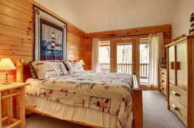 bedroom in one of the 5 bedroom cabins in Gatlinburg