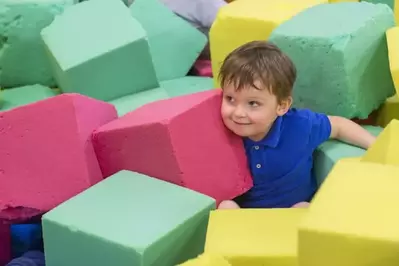 child in a foam pit