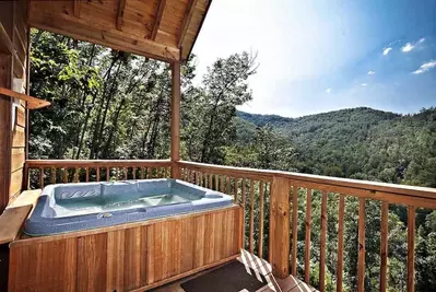 Hot tub on the deck of the Abundant Views cabin.