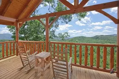 Beautiful mountain views from the deck of the Time Well Wasted cabin.