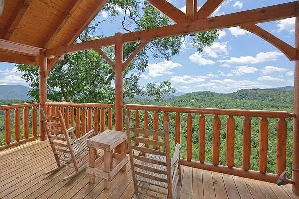 Beautiful mountain views from the deck of the Time Well Wasted cabin.