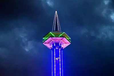 Stunning photo of the Gatlinburg Space Needle illuminated at night.