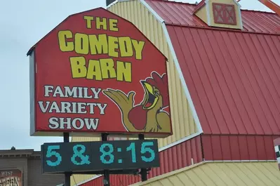 The sign for the Comedy Barn in Pigeon Forge.