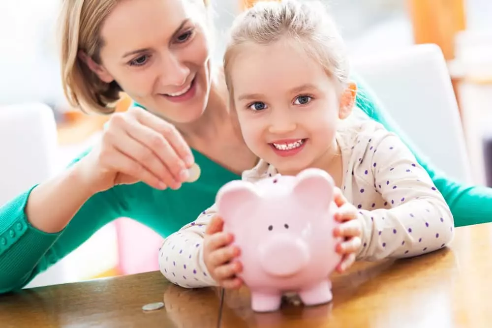 mom and daughter saving money on a 2 bedroom luxury cabin