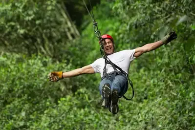 happy man ziplining in the Smokies