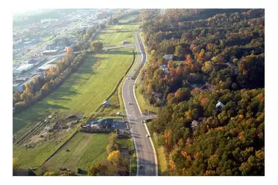 Overview of side road new Pigeon Forge Cabins near the Parkway