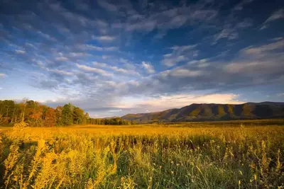 View of the mountains around Cades Cove with bright autumn colors