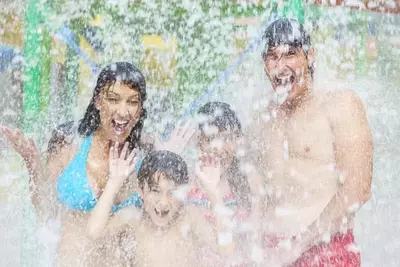 family at a water park