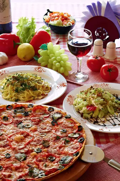 Pizza, pasta, and wine