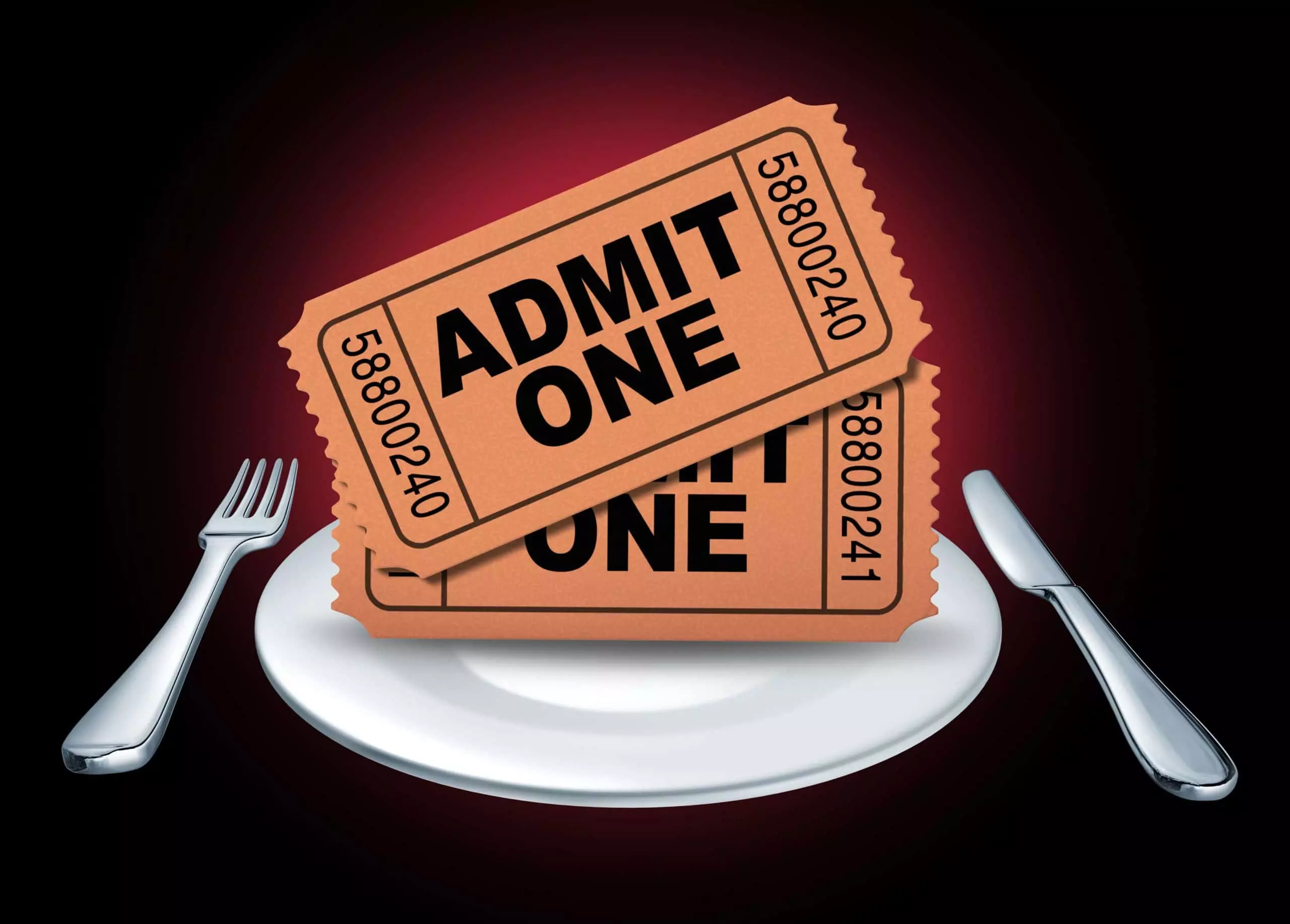Two "Admit One" tickets on white plate