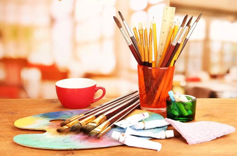 Pencils, brushes, and watercolors for arts and crafts