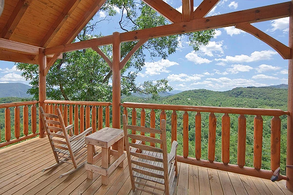 Two chairs on the deck of one of Time Well Wasted, our romantic Smoky Mountain cabins.