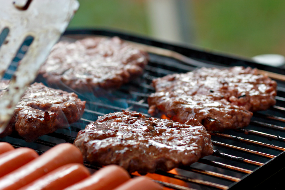 [Hamburgers an hot dogs on the grill at our Pigeon Forge TN vacation rentals.