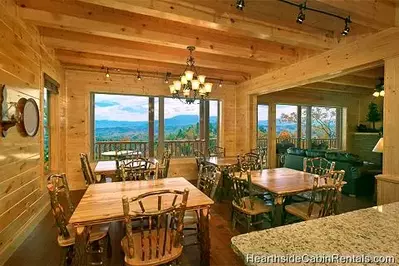 Open dining room with mountain view at Pigeon Forge cabin Grand View Lodge