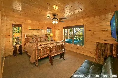 King bedroom at Grand View Lodge that overlooks hot tub