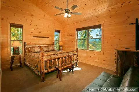 King suite with futon bed and mountain view at Grand View Lodge cabin in Pigeon Forge