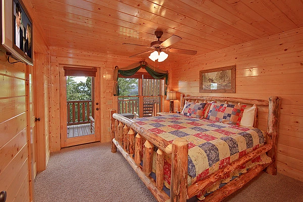King size suite with tv at Heavenly Heights 8 bedroom large Pigeon Forge cabin rental