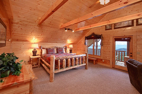 King size suite with private deck at Heavenly Heights 8 bedroom cabin rental in Pigeon Forge
