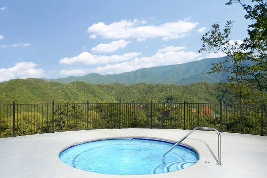 Outdoor hot tub at The Preserve Resort overlooking the mountains
