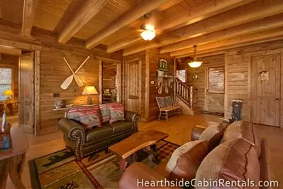 Rustic decor and comfortable furniture inside the Mountain Top Retreat cabin in Pigeon Forge.