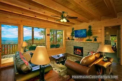 Electric fireplace and flat-screen tv at A View For All Seasons cabin near Gatlinburg