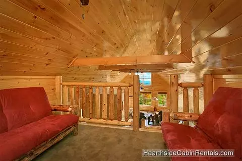 Sitting area and loft at cabin near Gatlinburg A View For All Seasons