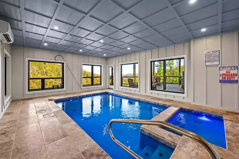 Swimming In The Smokies cabin indoor pool with view