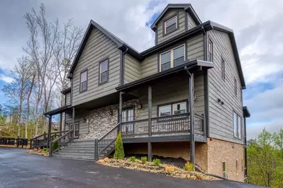 misty hibernation retreat is a top pigeon forge cabin for large groups