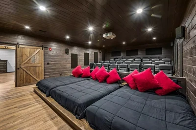 home theater at lucid dreams lodge makes it a great Smoky Mountain family reunion cabin
