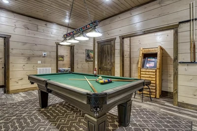 game room at misty hibernation retreat makes it a great Smoky Mountain family reunion cabin